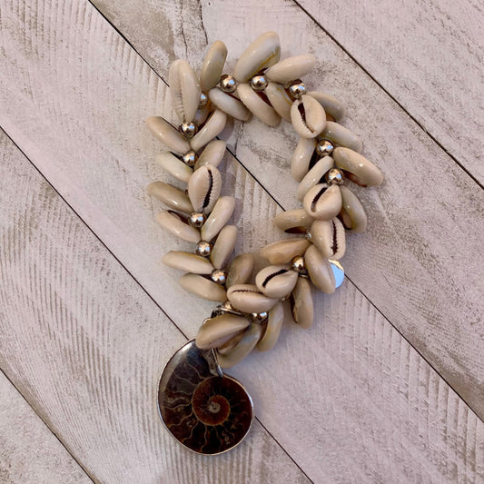 Puka Shells Stretchy Bracelet with One of a Kind Ammonite Pendant