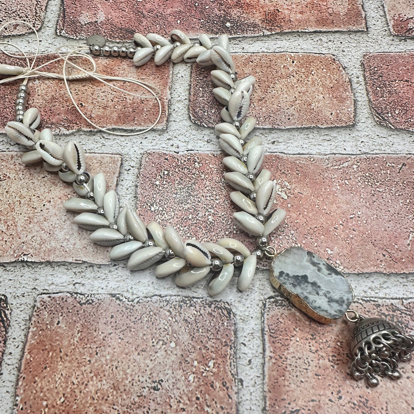 Cowry shell necklace with focal pendant Necklace | Erika Williner Designs