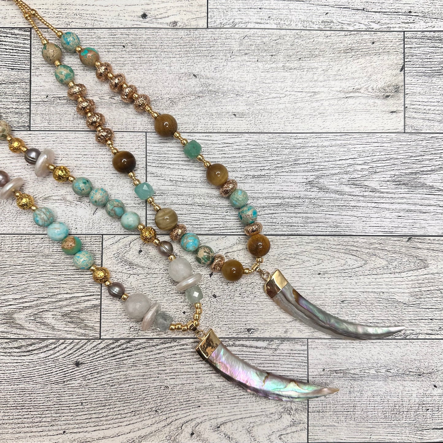 Abalone Pendant with Horn Shape, Faceted Fluorite, Gray Pearls, Coin Shape Pearls, Lava Rock, Turquoise Beads and Golden Glass Seed Beads | Erika Williner Designs