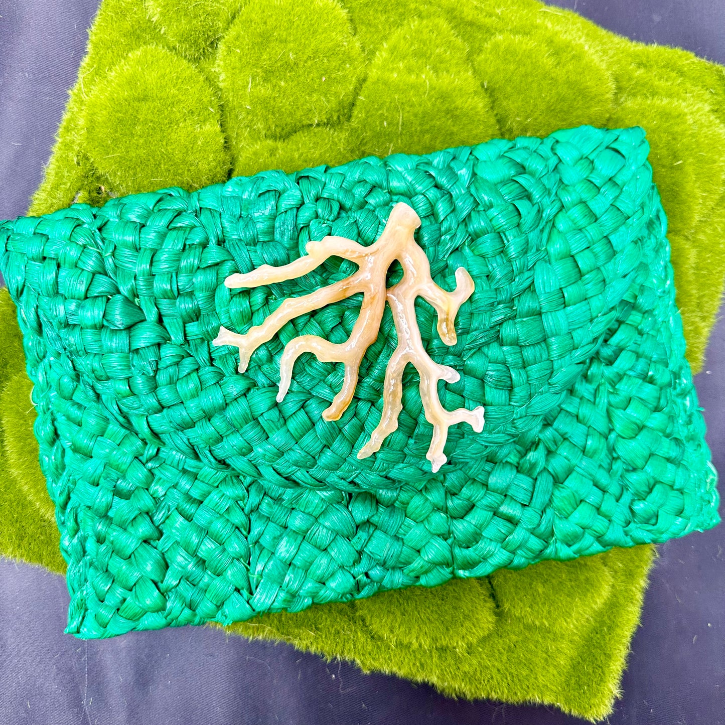 green straw clutch