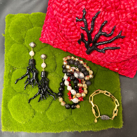 clutch and earrings and arm candy