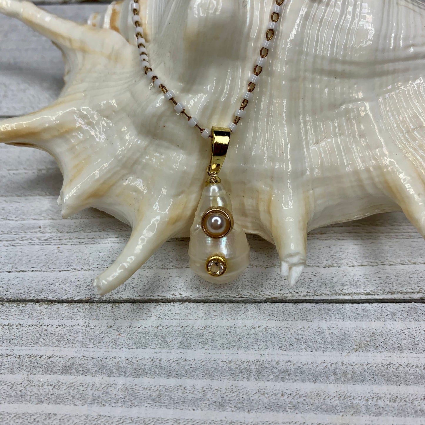 Blush beaded chain with a one of a kind baroque pearl necklace