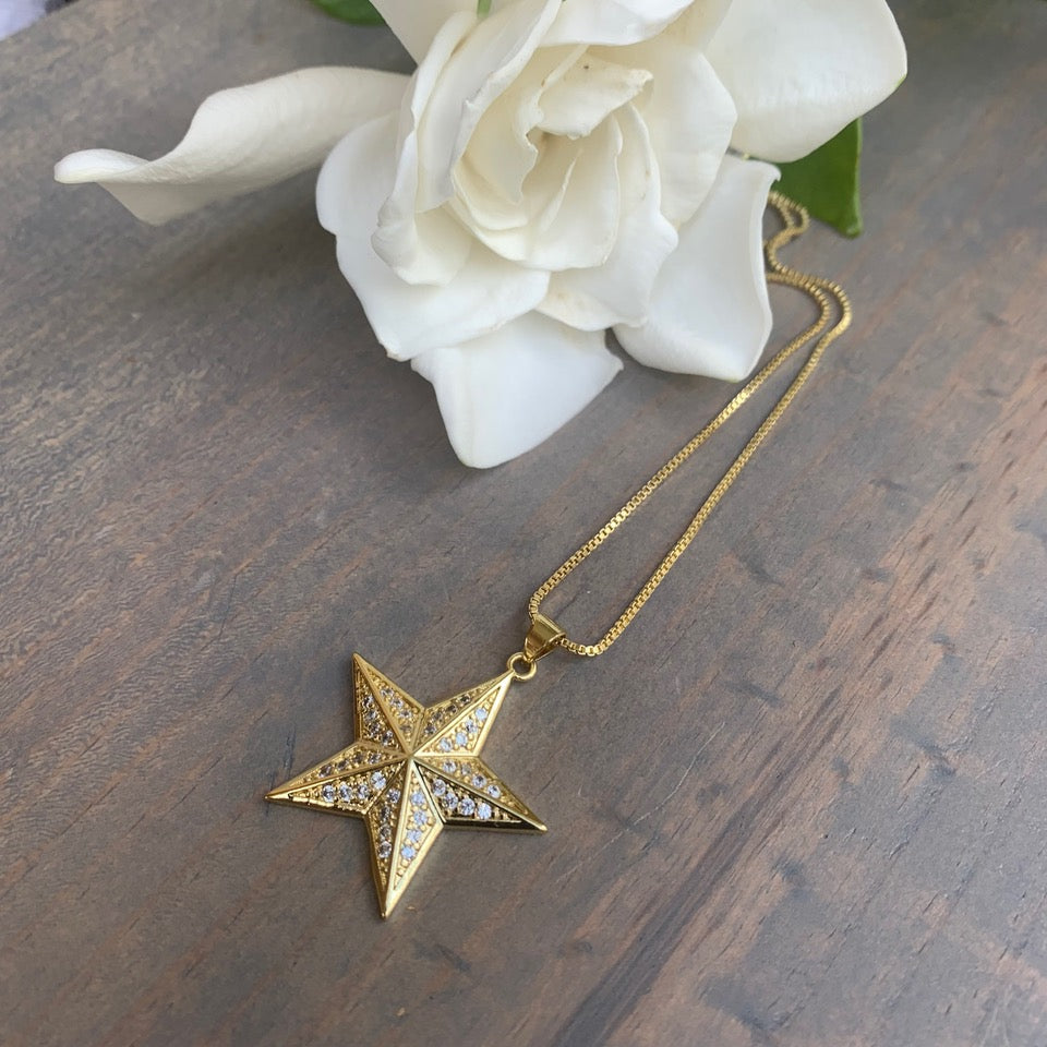 Elegant Gold Plated Chain with a Gold Star Pendant Embellished with Pave Crystals