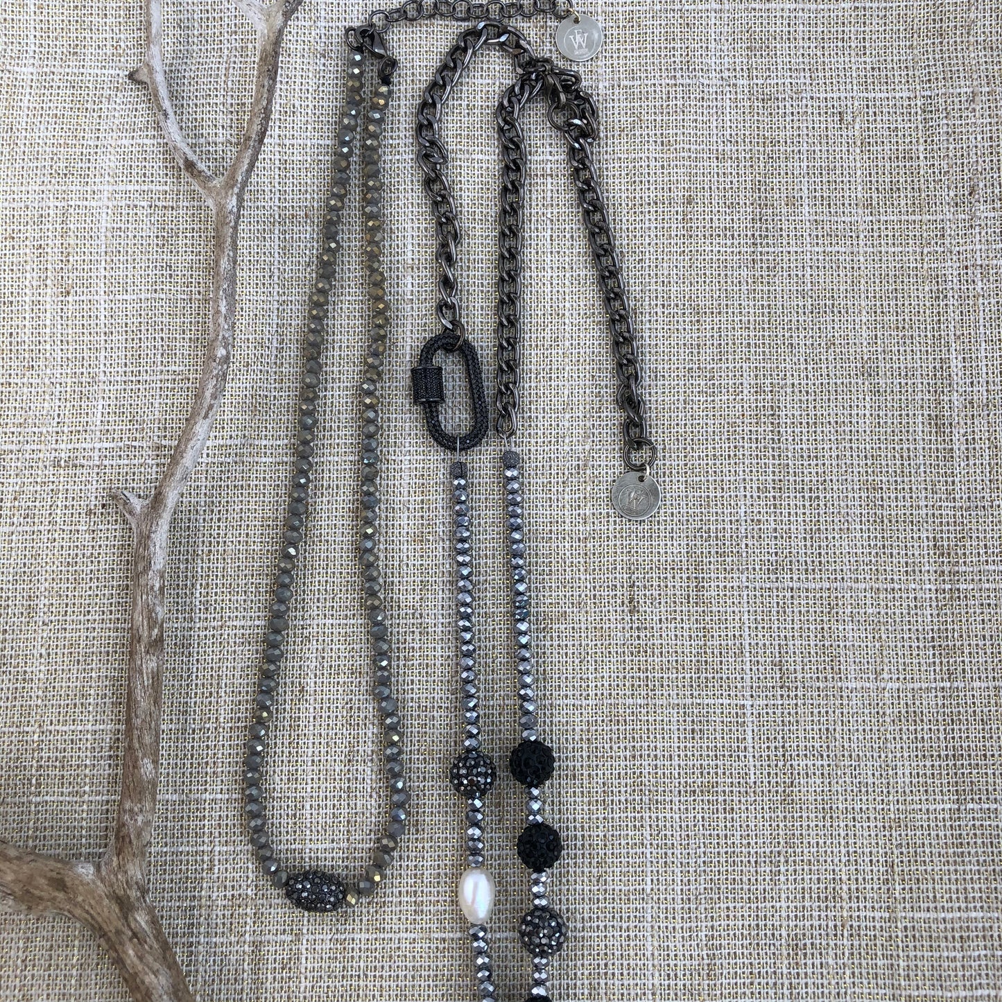 Shiny Silver Crystals Necklace with an oblong pave embellished beads in the center