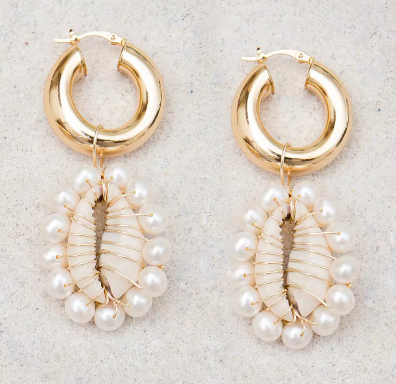 Gold plated earrings with cowry shells and fresh water pearls