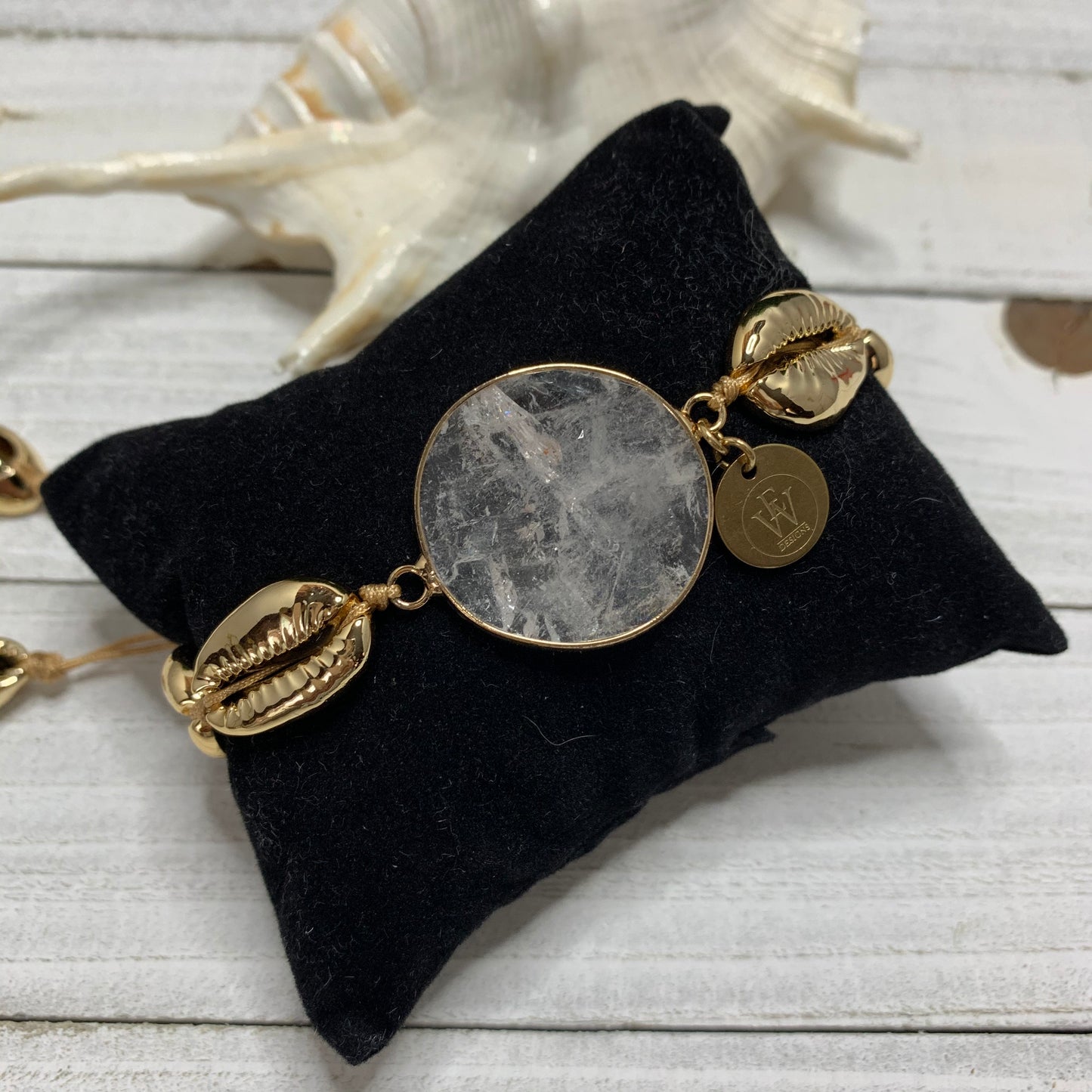 Gold Plated Cowry Shells Bracelet with a Faceted Quartz Connector 440-03 | Erika Williner Designs