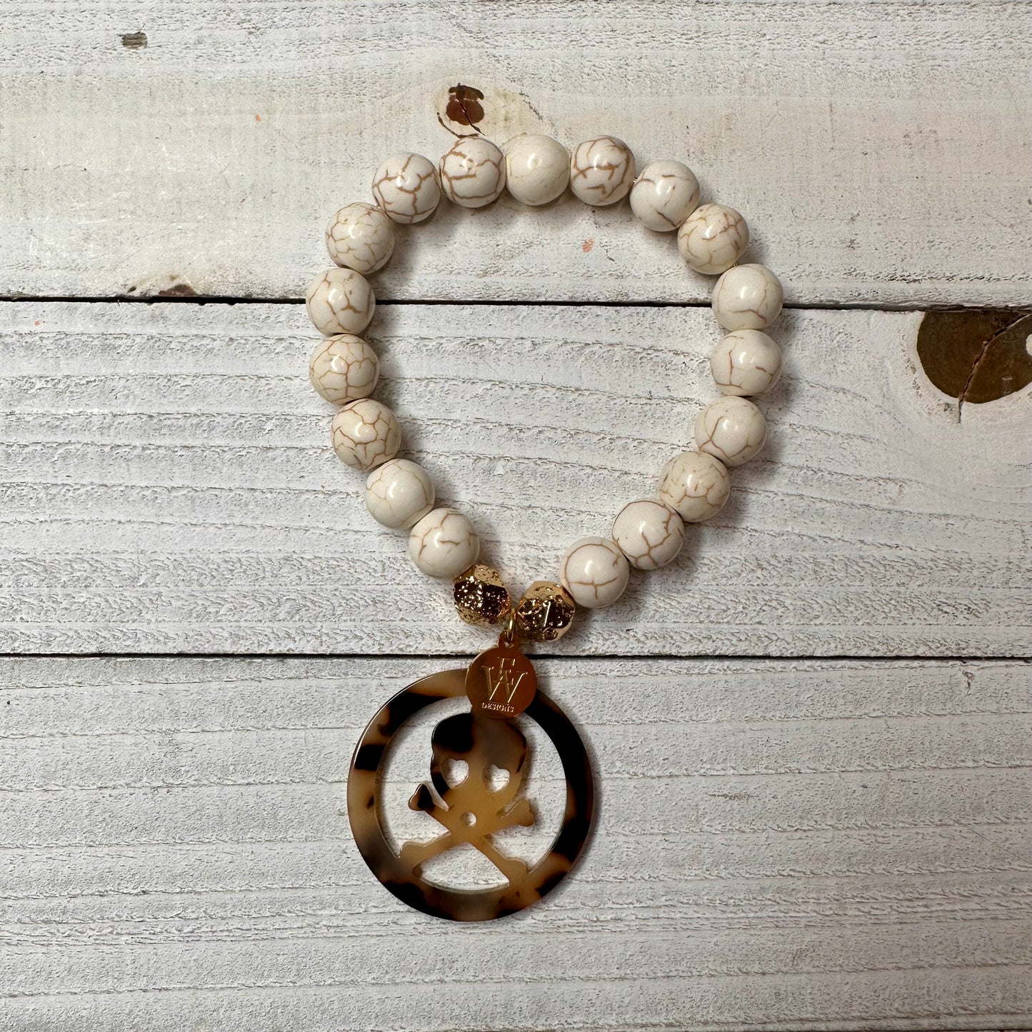 White Magnesite/leopard charm