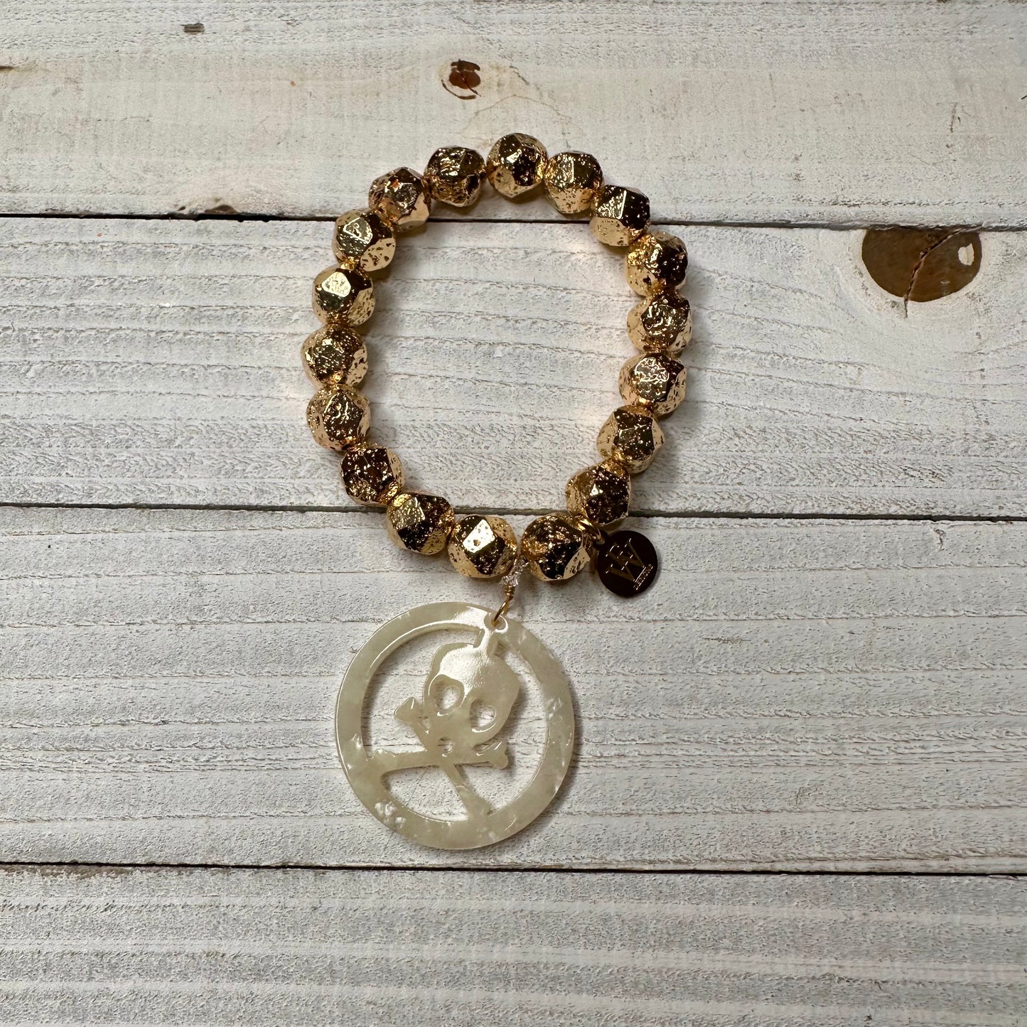 Stretchy Bracelet with Crossed Bones and White Skull Charm