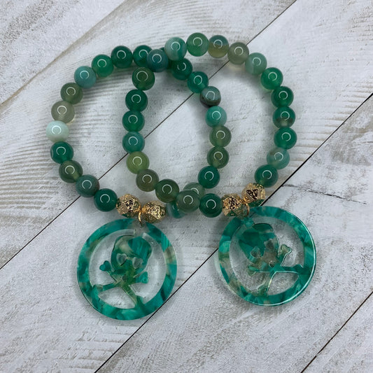 6mm Agate Beads Bracelet with an acetate crossbones and skull charm