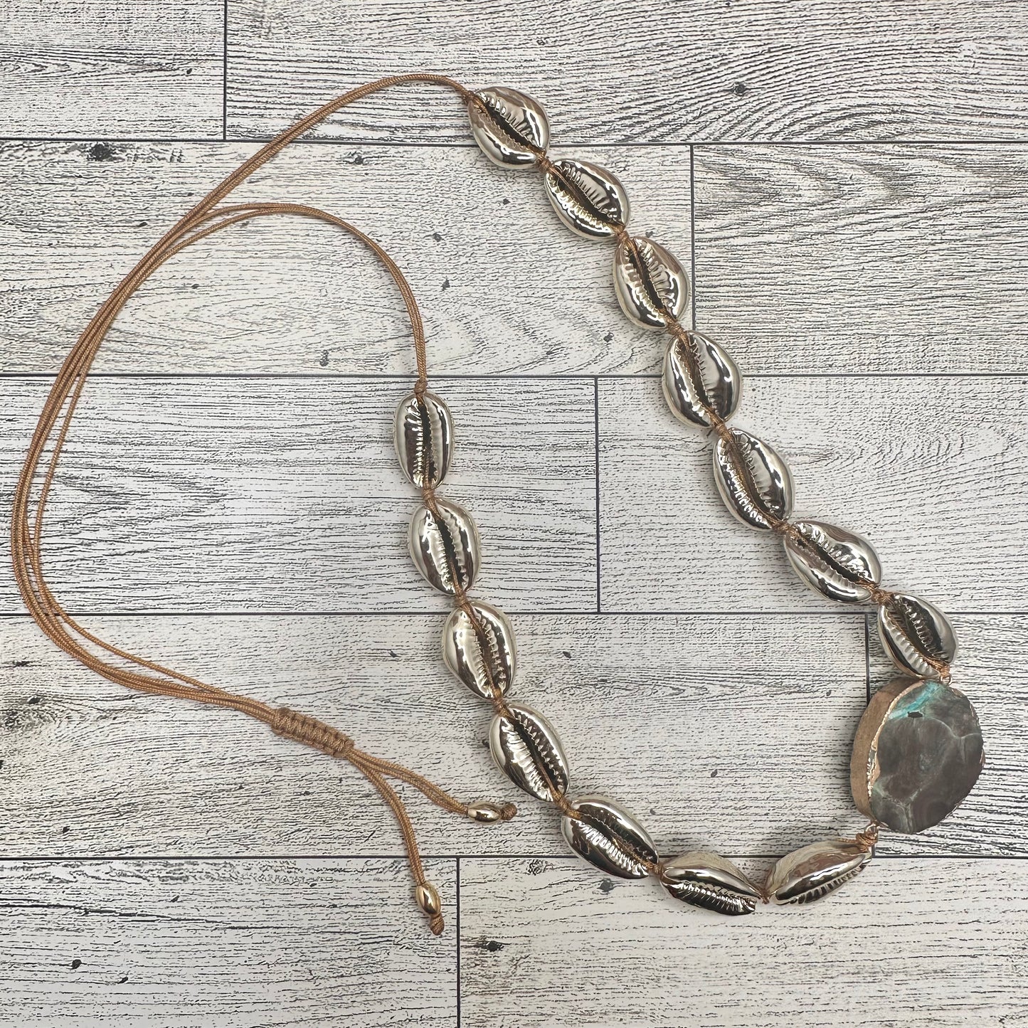 Gold Cowry Shells Necklace with Turquoise connector | Erika Williner Designs