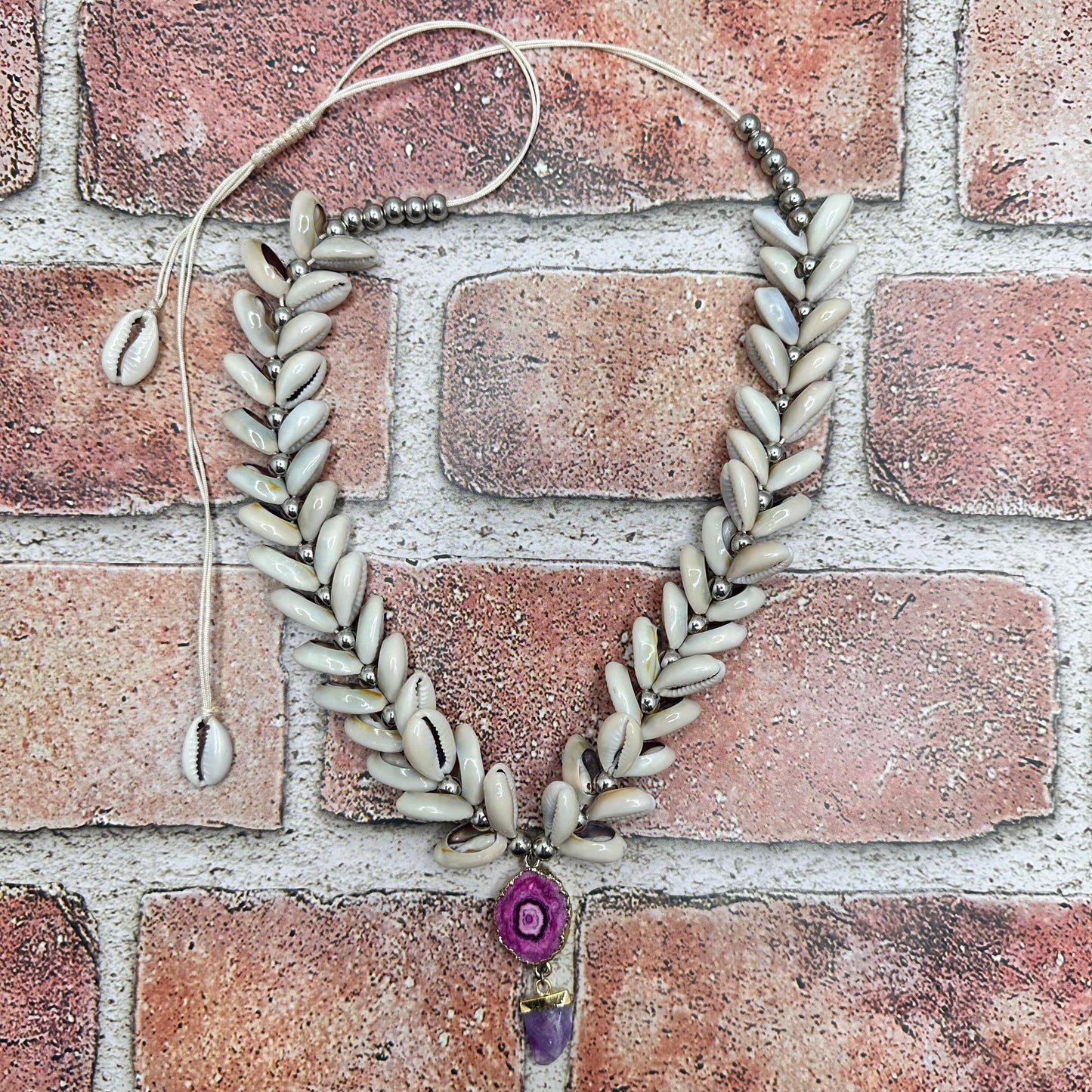 Cowry shell necklace with focal pendant Necklace | Erika Williner Designs