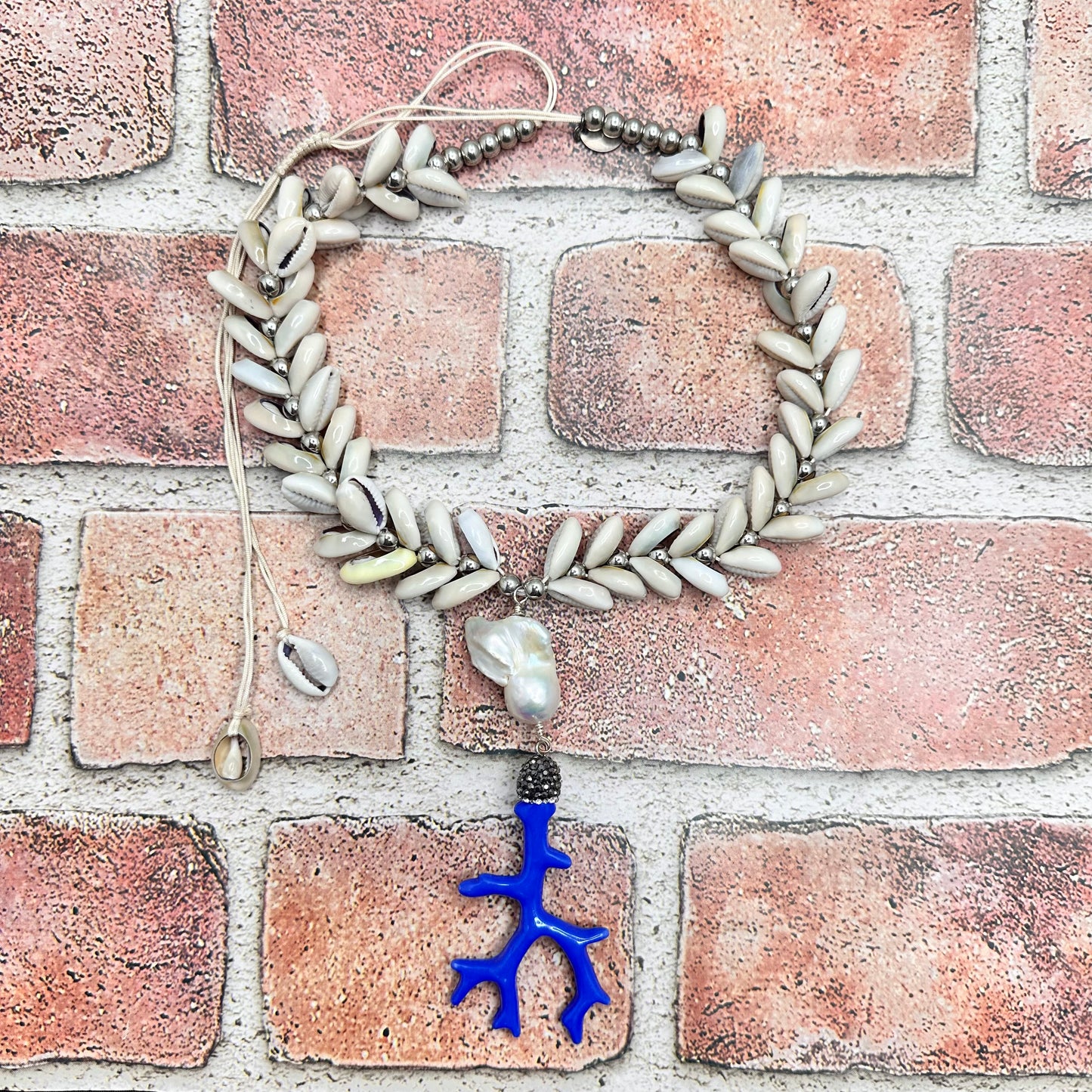 Cowry shell necklace with focal pendant Necklace | Erika Williner Designs