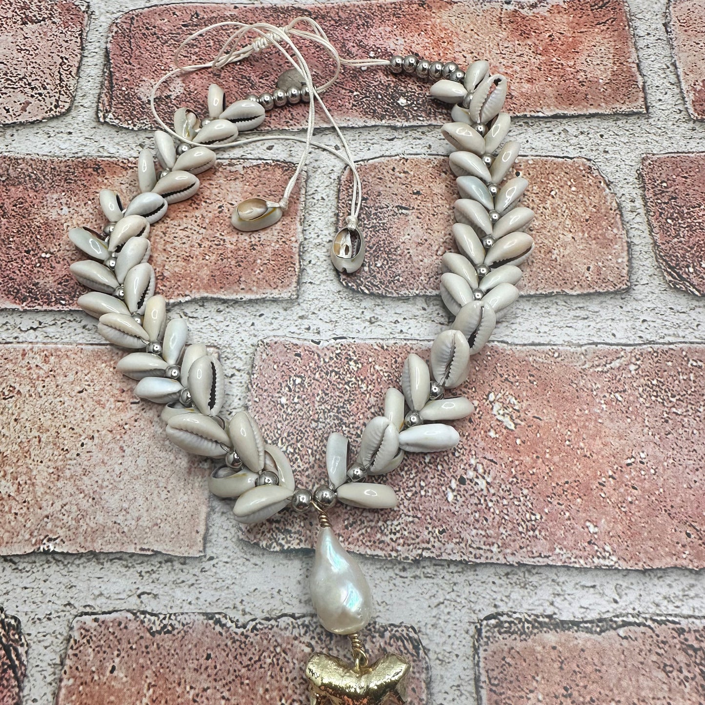 Cowry shell necklace with focal pendant Necklace | Erika Williner Designs