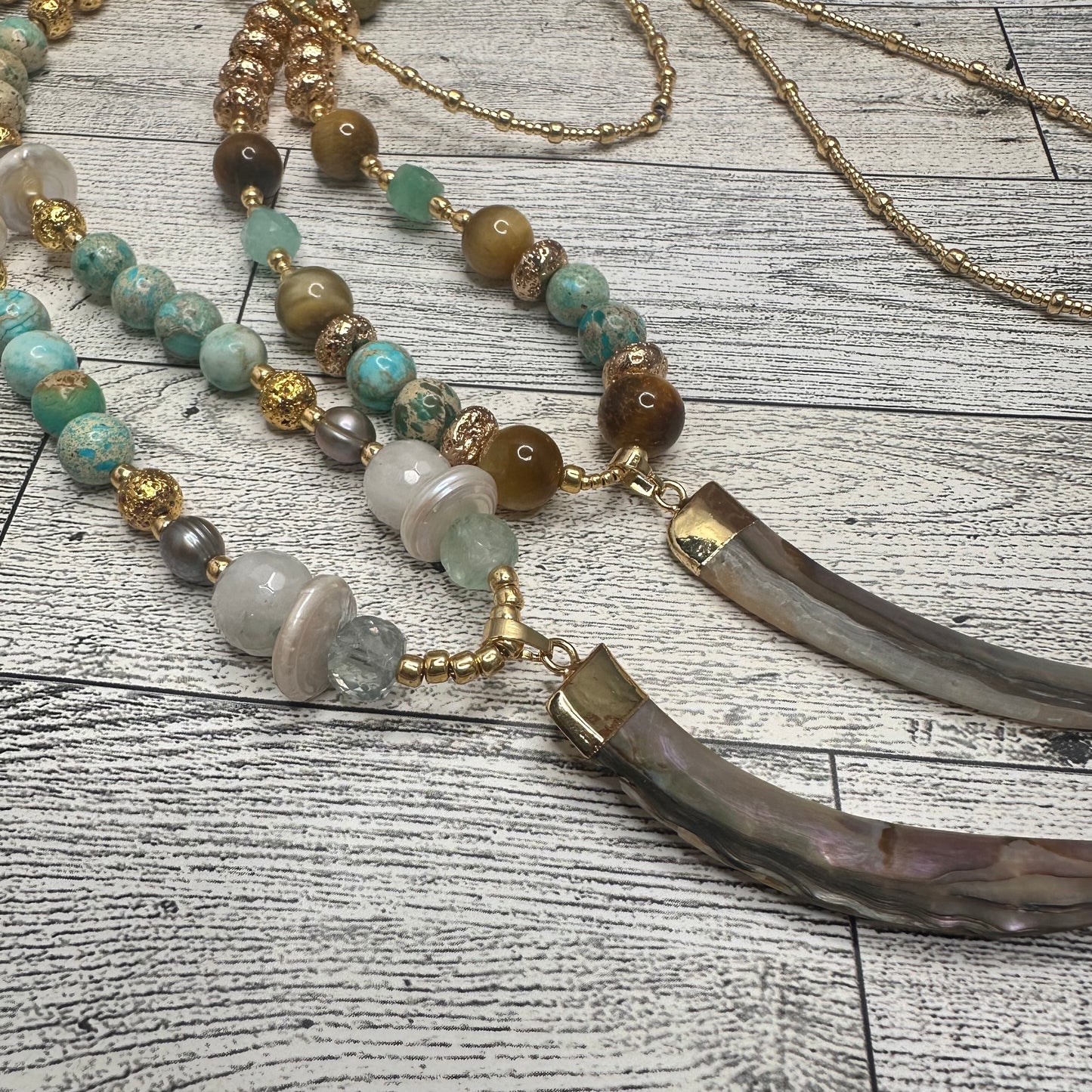 Abalone Pendant with Horn Shape, Faceted Fluorite, Gray Pearls, Coin Shape Pearls, Lava Rock, Turquoise Beads and Golden Glass Seed Beads | Erika Williner Designs