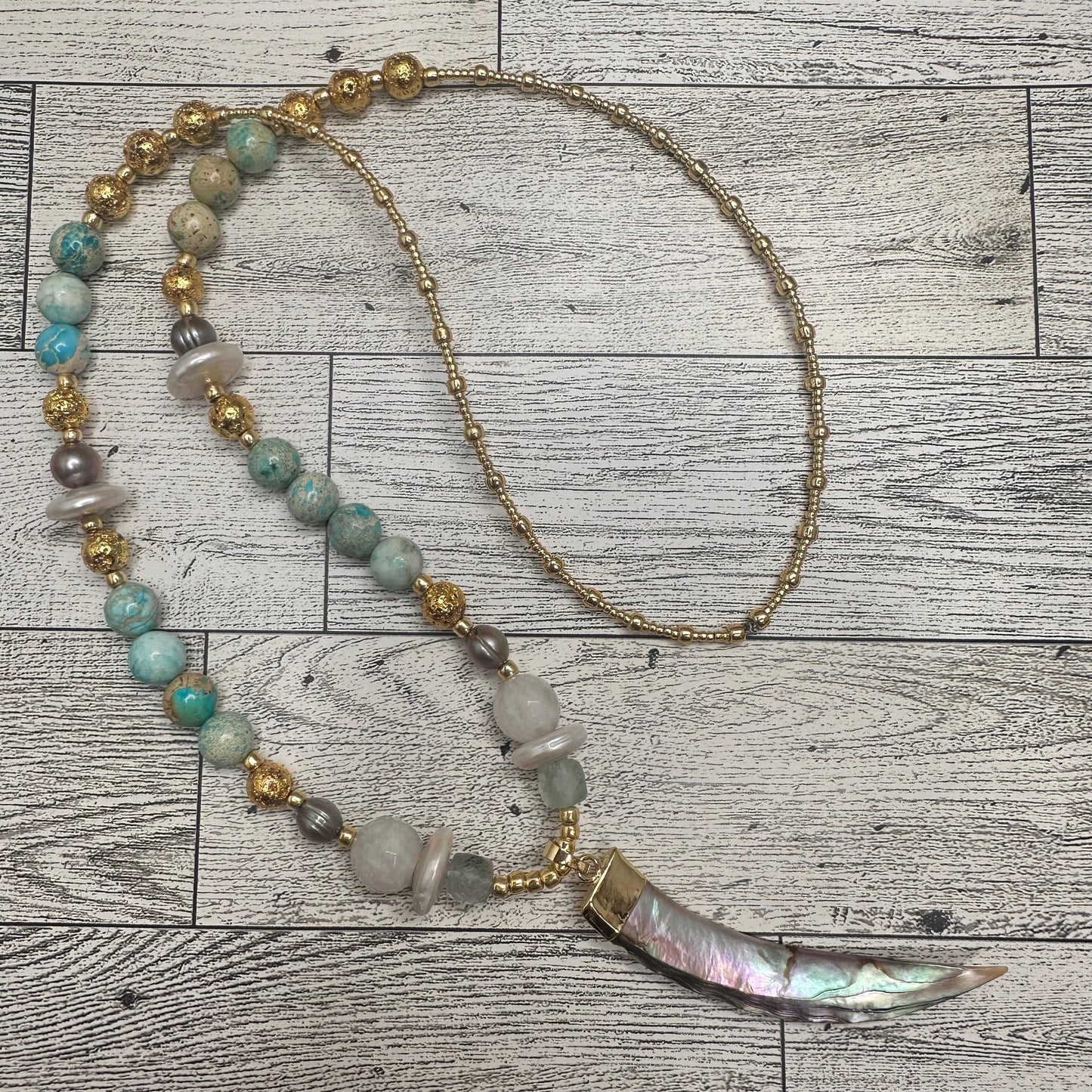 Abalone Pendant with Horn Shape, Faceted Fluorite, Gray Pearls, Coin Shape Pearls, Lava Rock, Turquoise Beads and Golden Glass Seed Beads | Erika Williner Designs