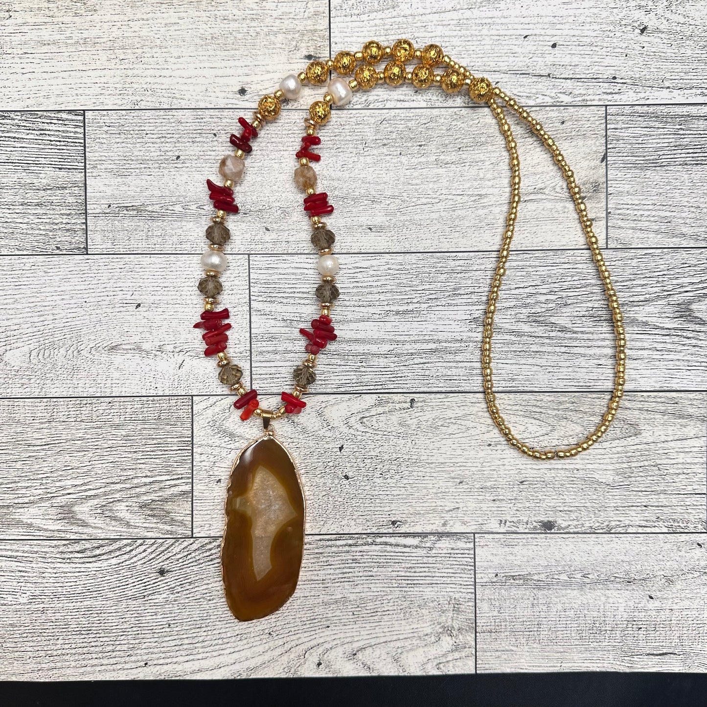 Brown Agate Pendant with Smoky Faceted Crystals, Red Coral Branches, Faceted Citrines, Fresh Water Pearls, Lava Rock and Golden Glass seed Beads | Erika Williner Designs