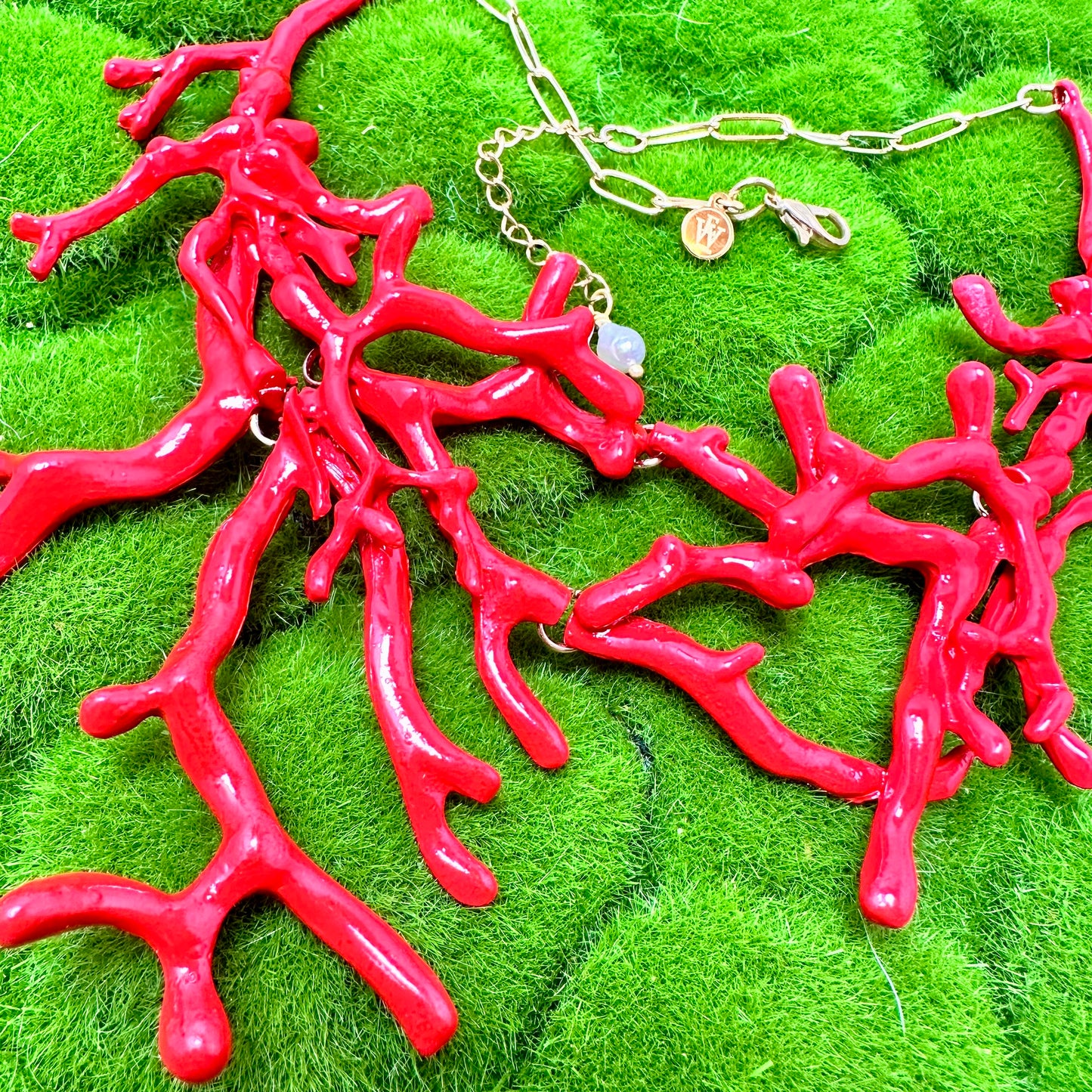 close up view of red coral necklace