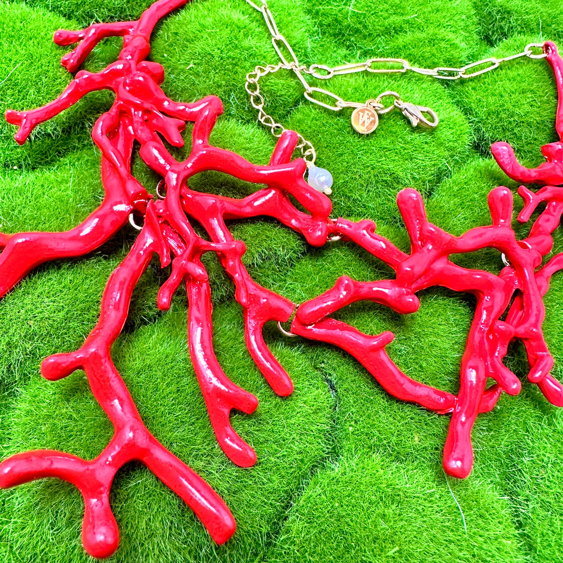 close up view of red coral necklace