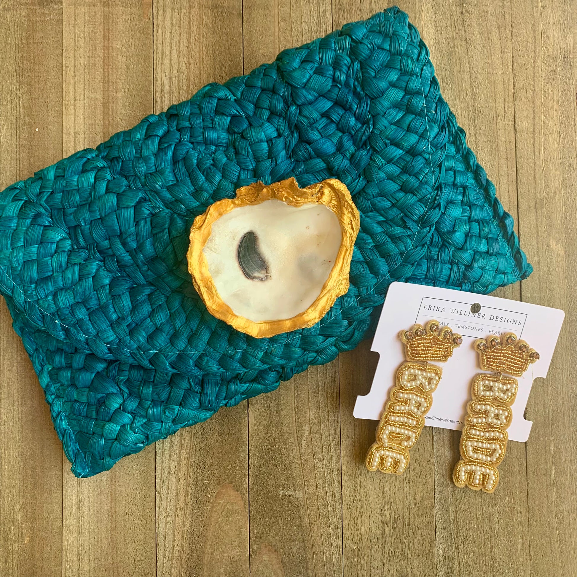 Bride earrings beside a classic erika willner turquoise purse