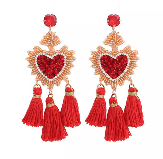 front view of red heart earrings