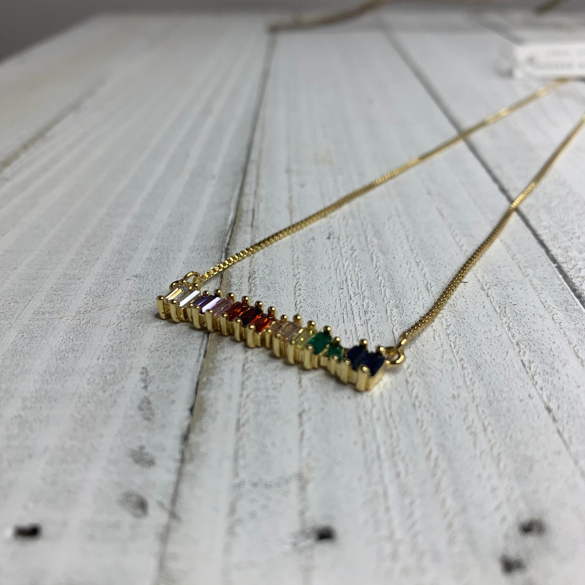 different angle of the cz multicolor bar necklace