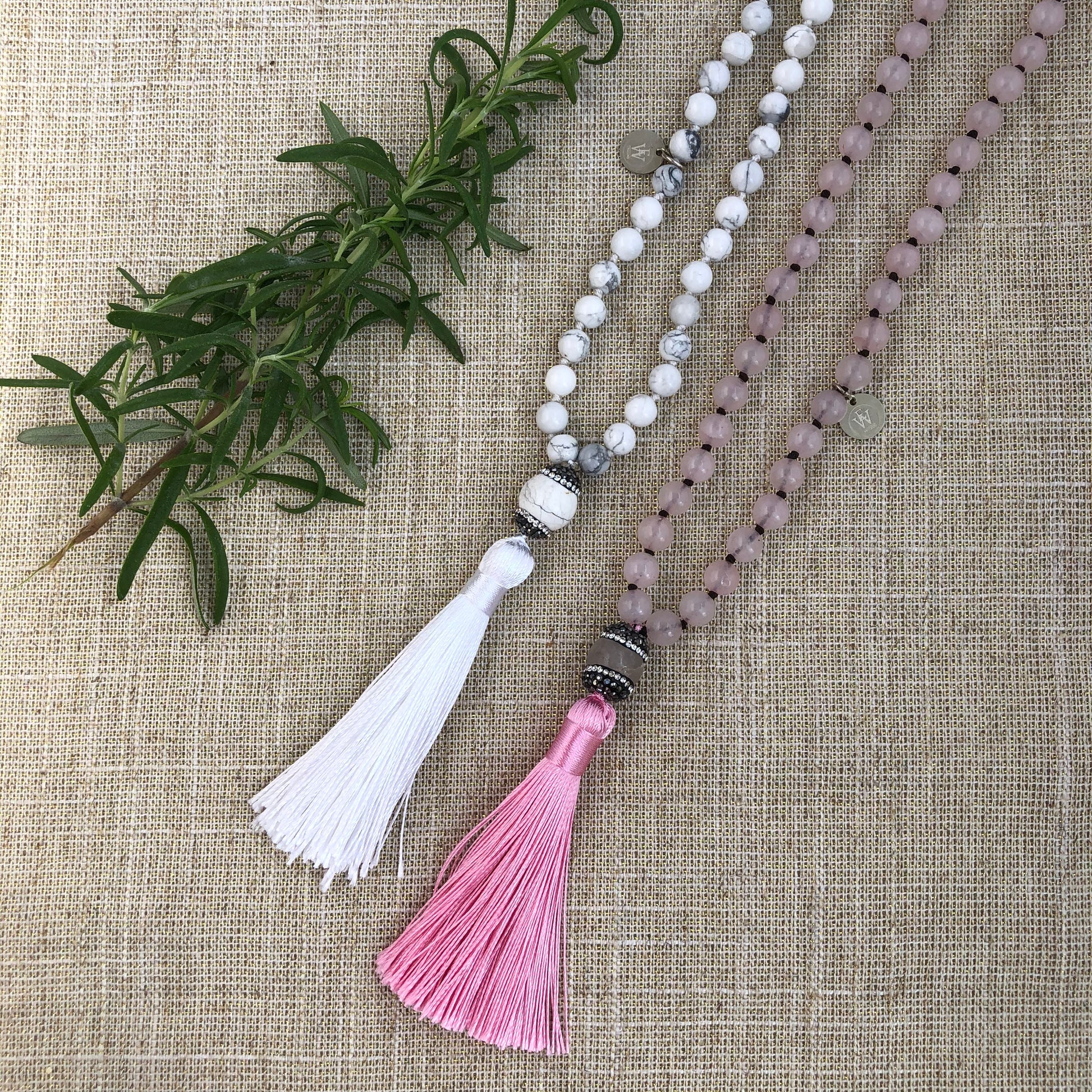 Hand Knotted Rose Quartz Necklace it has an Embellished Beads and a Soft Silk Tassel