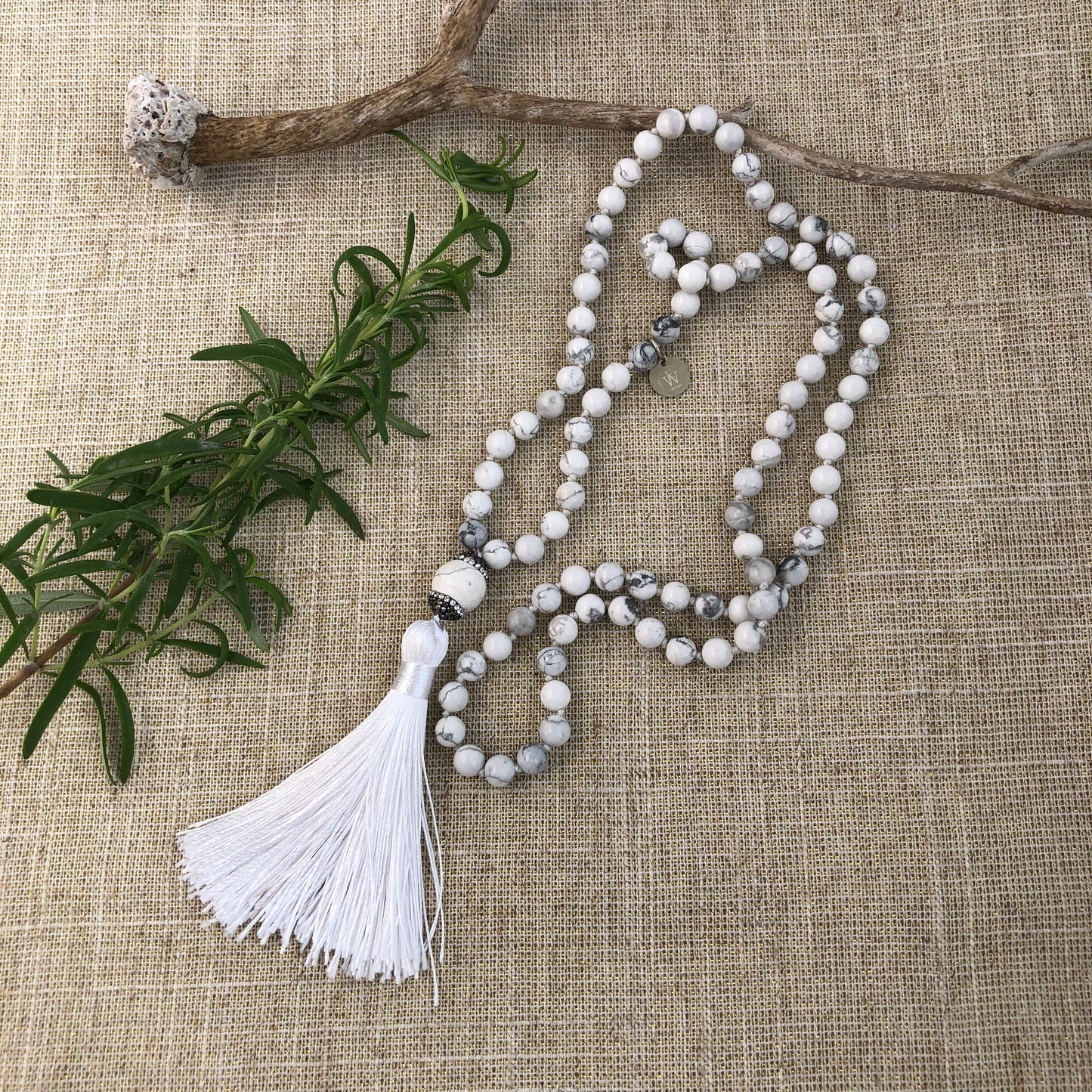 Hand Knotted White Magnesite Necklace it has an Embellished Beads and Silk Tassel