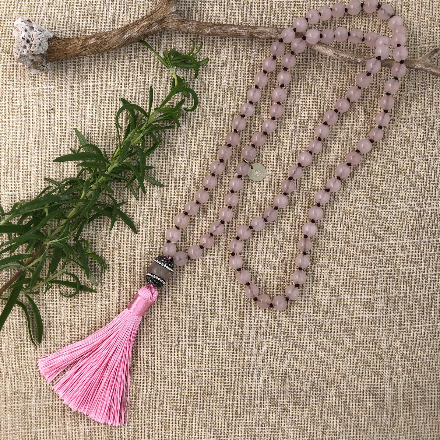 Hand Knotted Rose Quartz Necklace it has an Embellished Beads and Silk Tassel