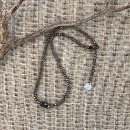 Silver Crystals Necklace with an oblong pave embellished beads in the center