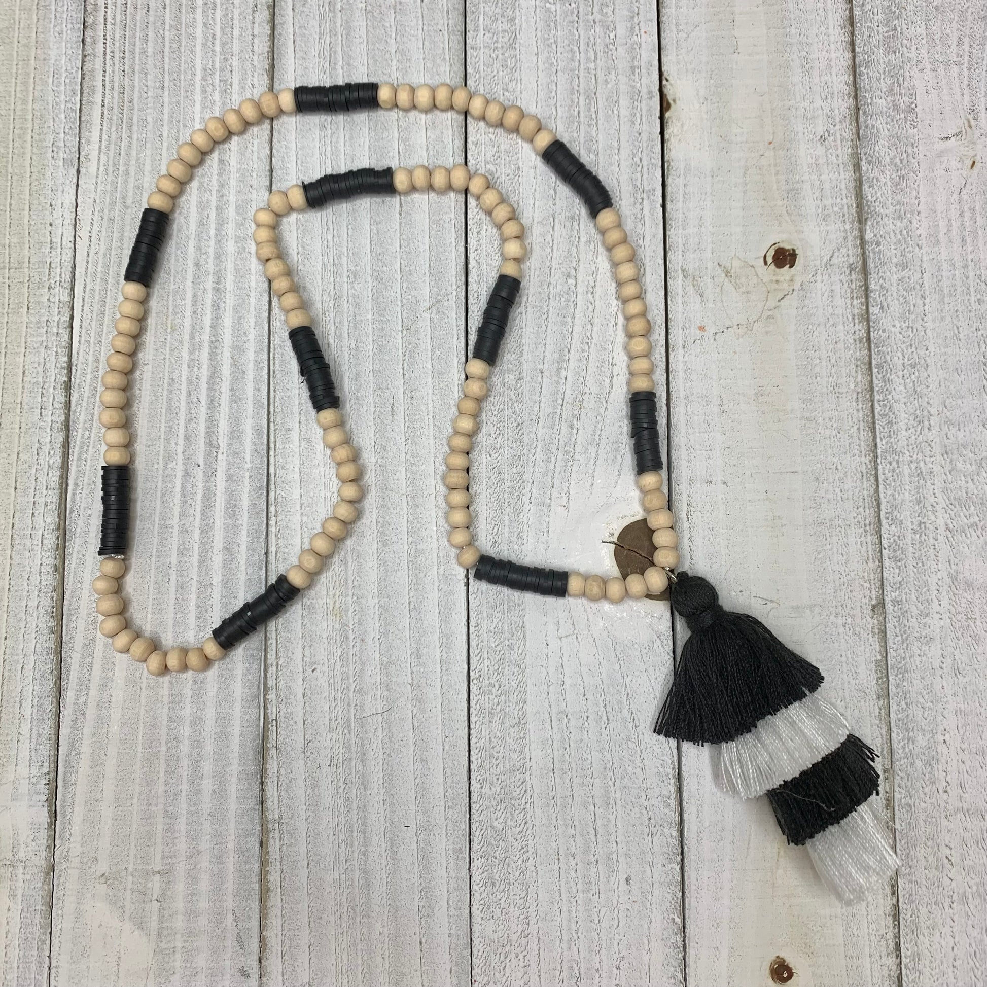 Wooden Round Beads, Black Doughnut Beads with a Cotton Tassel Necklace