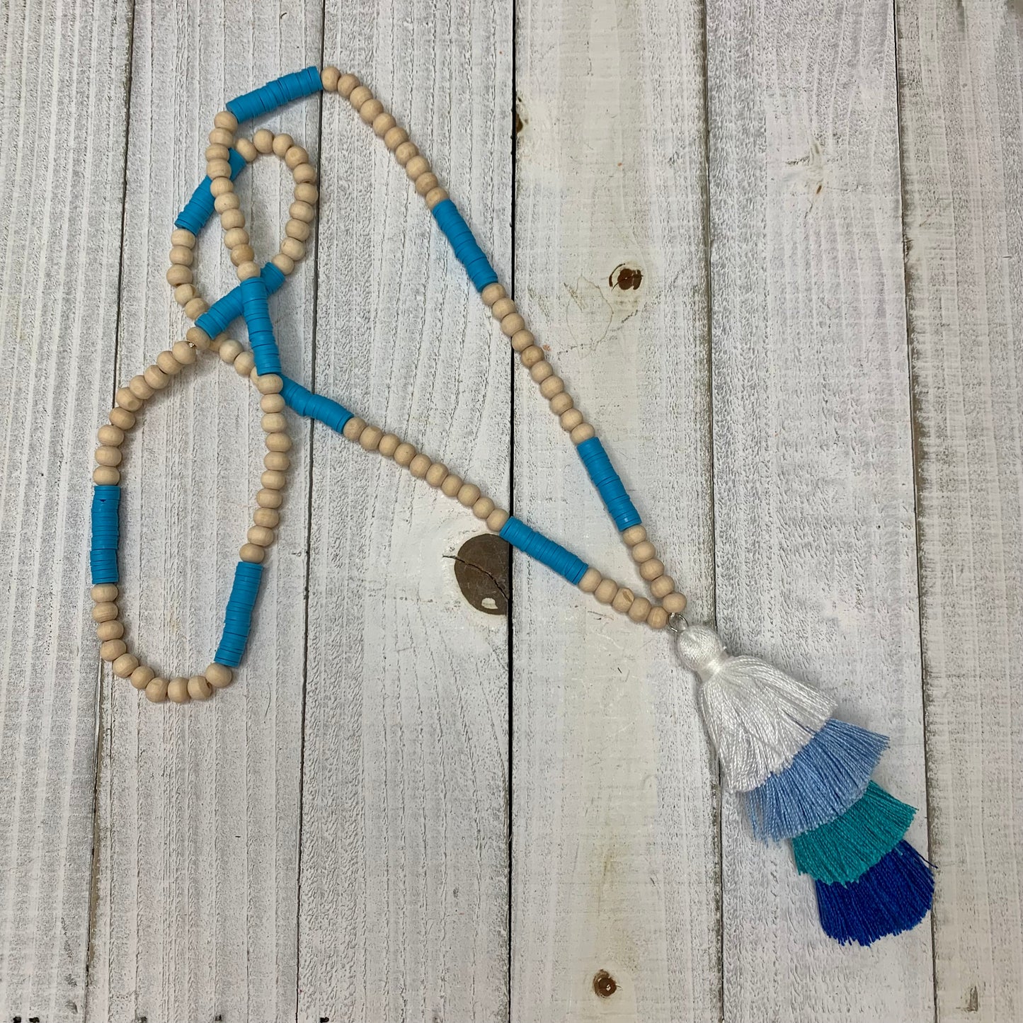 Turquoise Doughnut Beads with a Cotton Tassel Necklace