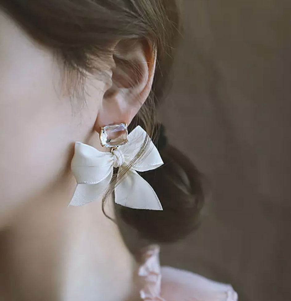 white bow ribbon earrings