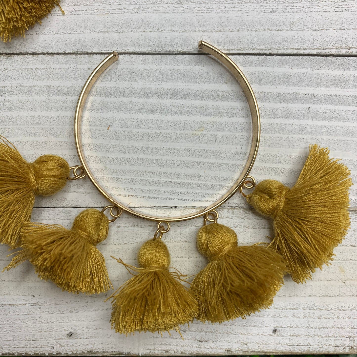 Gold cotton tassels bracelet