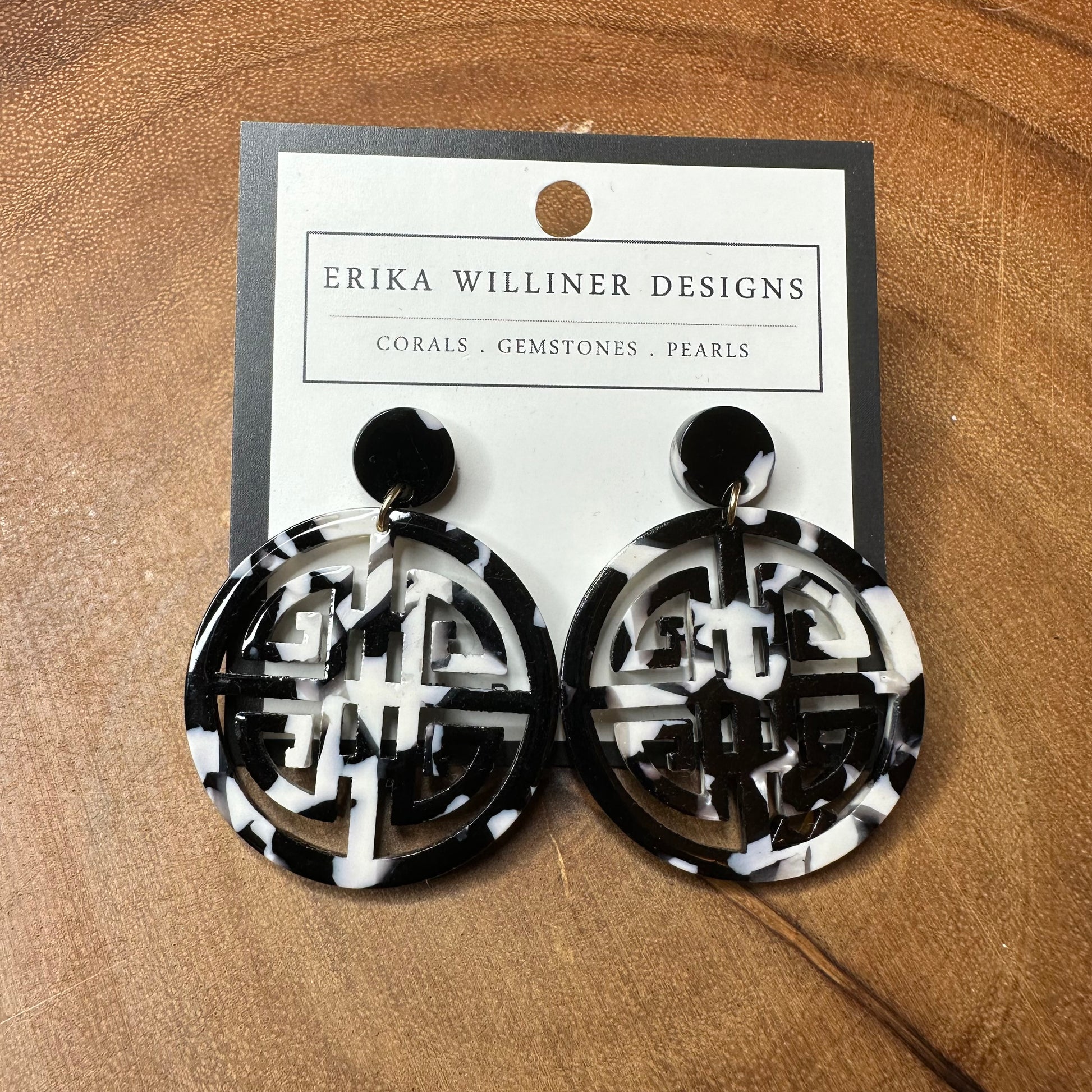 black and white circle earrings front view