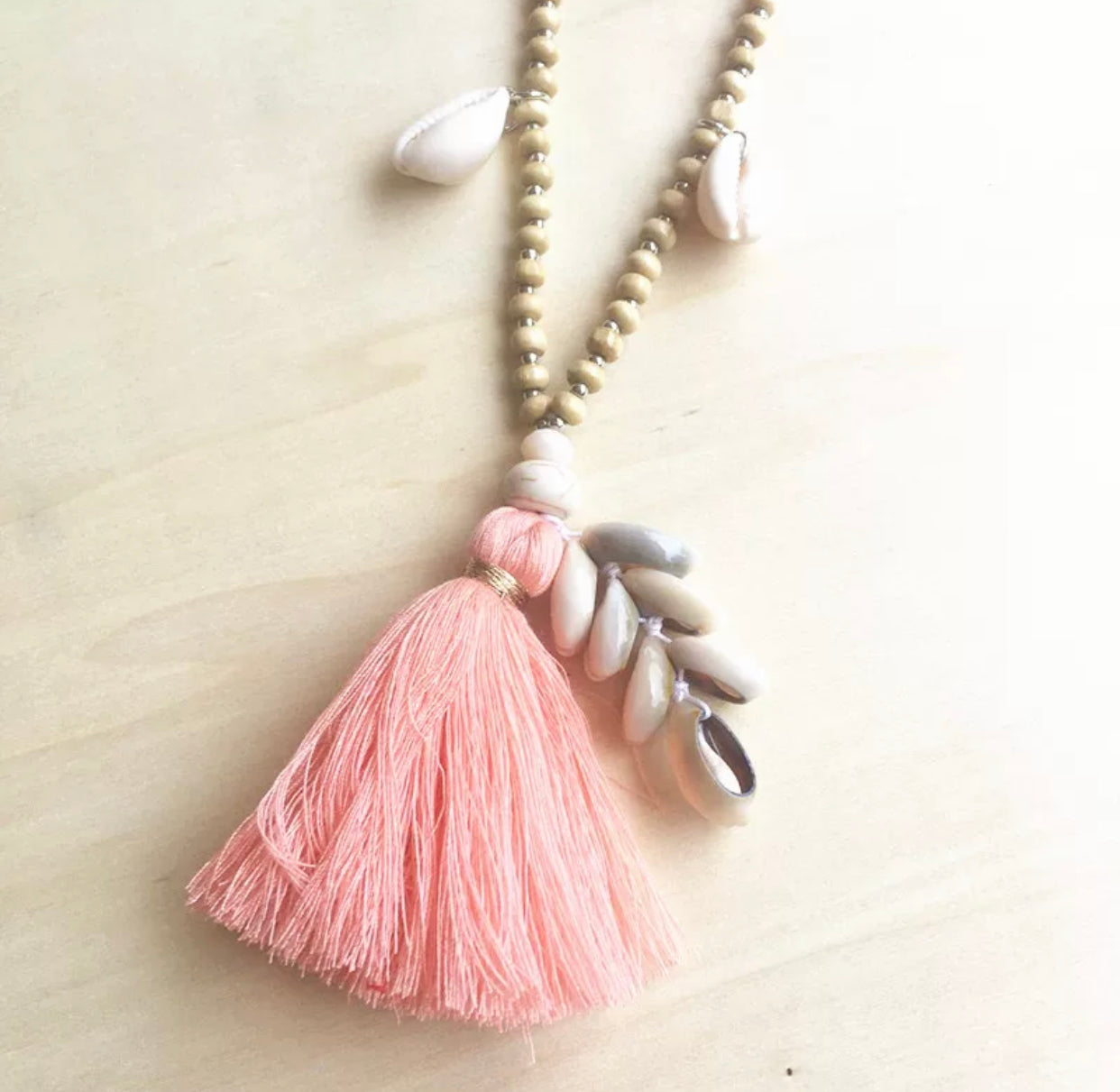 Cowry Shells and Cotton Tassels