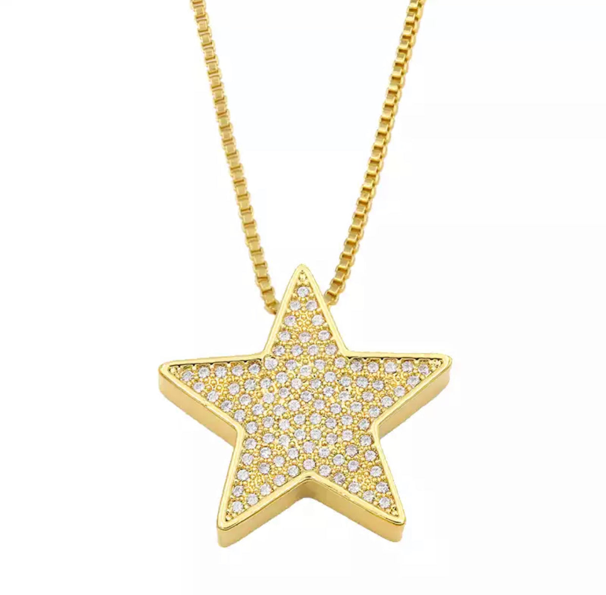 Gold Plated necklace features a gold star embellished with clear pave crystals