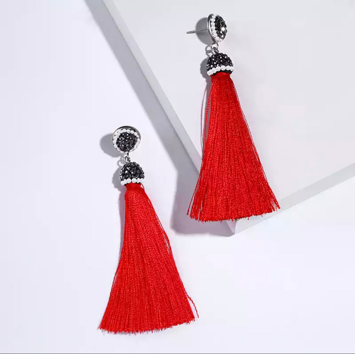 Pave embellished post earrings with red silk tassel