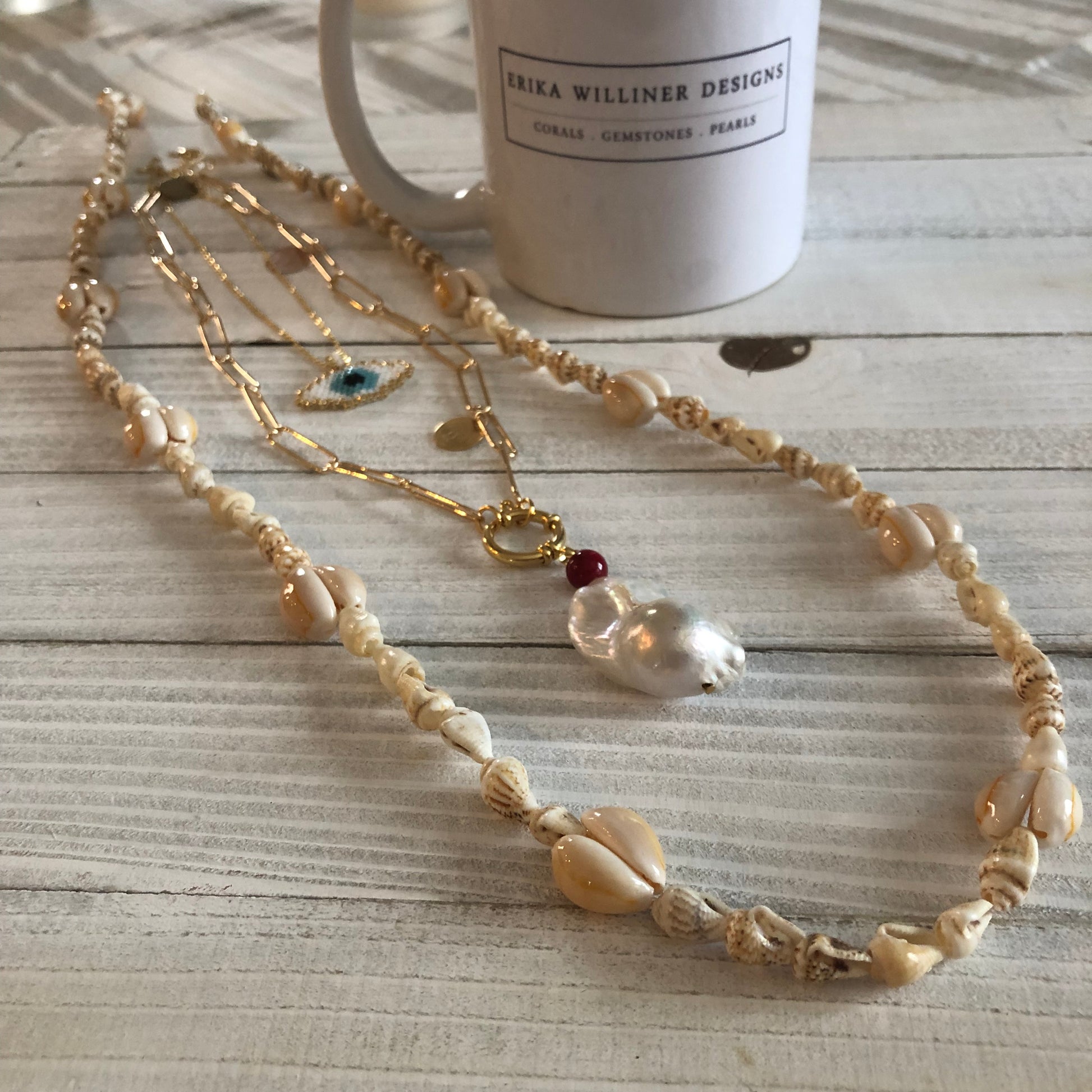 image showing layering with cowry shell necklace