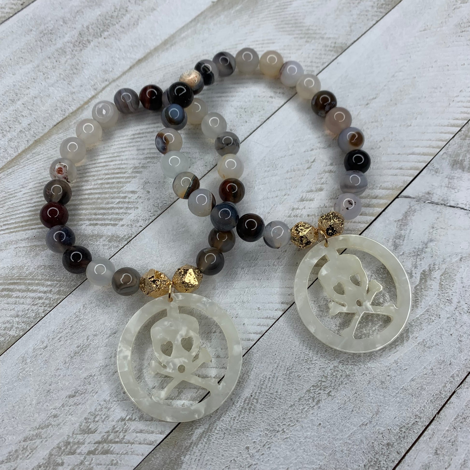 Stretchy 6mm Agate Beads Bracelet with an acetate crossed bones and skull charm 410-12 | Erika Williner Designs